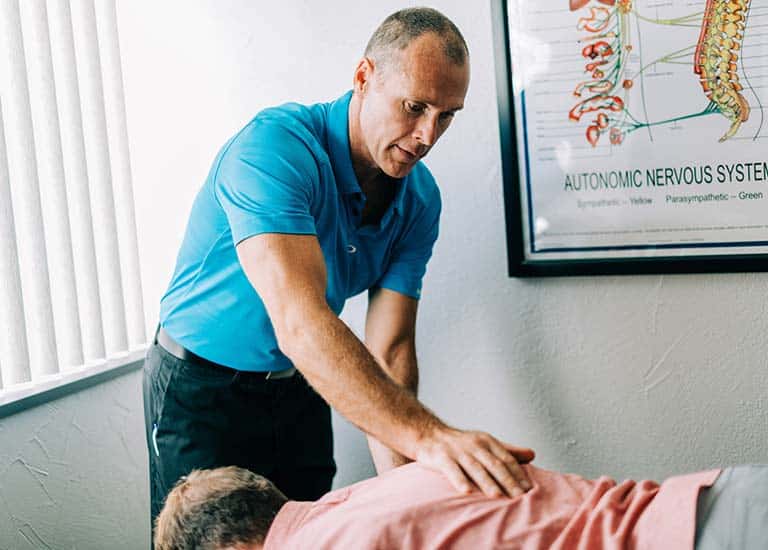 Dr Aaron Adult Chiropractic Adjustment