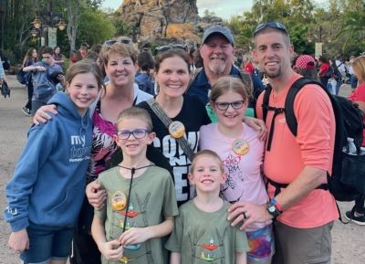 Karen with her family in Disney in early 2023, before starting functional medicine care with Dr. Rob Lindsey at Valeo in Eden Prairie, Minnesota.
